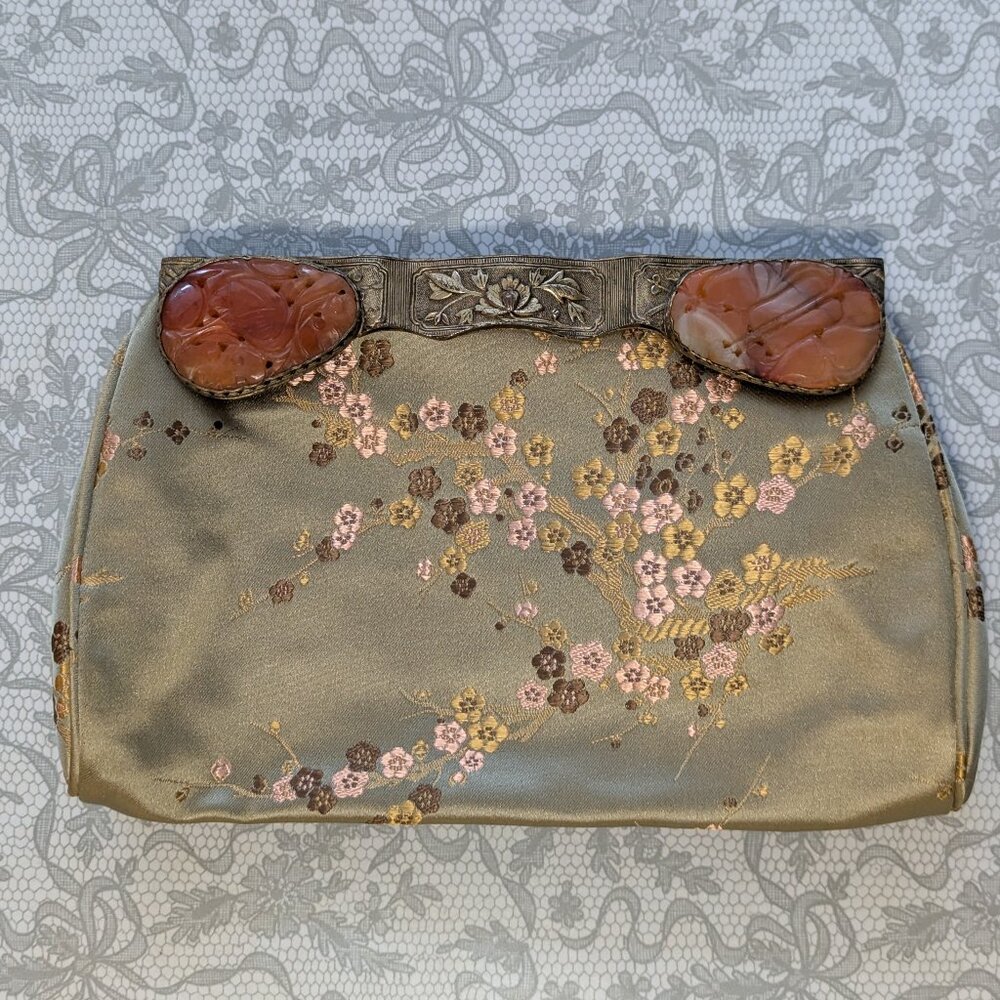 Gorgeous vintage clutch with metal and stone detail